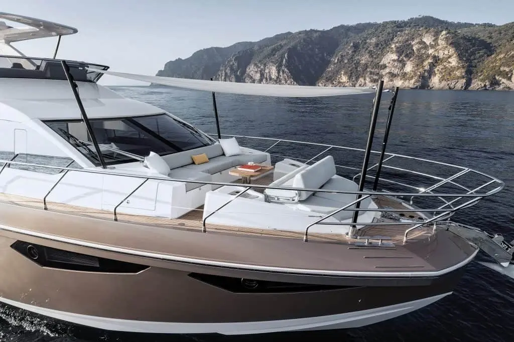 Azimut 60 Fly, aft deck — Mallorca Yachst Hire, Mallorca. Flybridge sunsets cruising toward Illetes from Palma