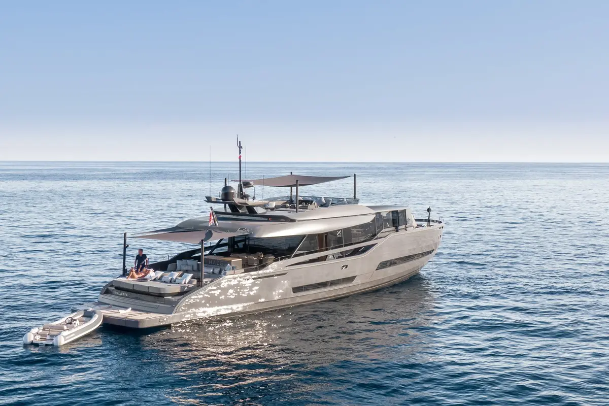 Extra 86, aft deck — Mallorca Yachst Hire, Mallorca. Sleek Italian lines for sunset runs toward Illetes