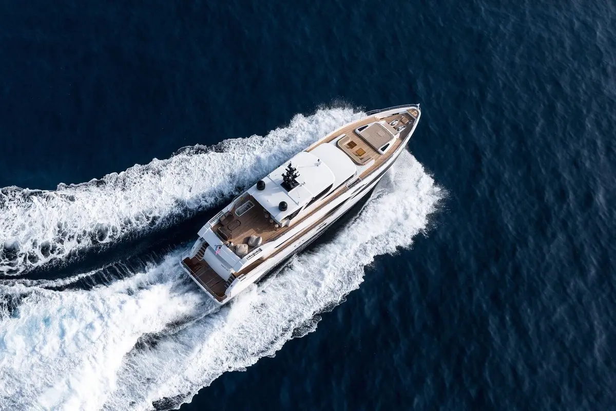Majesty 100, main deck — Mallorca Yachst Hire, Mallorca. Wide decks tracing Formentor's cliffs at sunrise