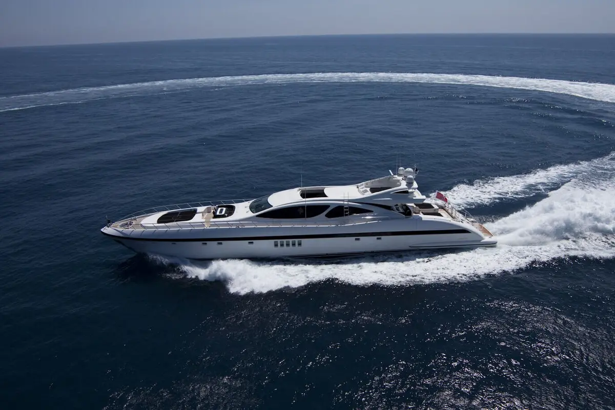 Mangusta 130, exterior — Mallorca Yachst Hire, Mallorca. Open-water speed toward Cap de Formentor at dusk