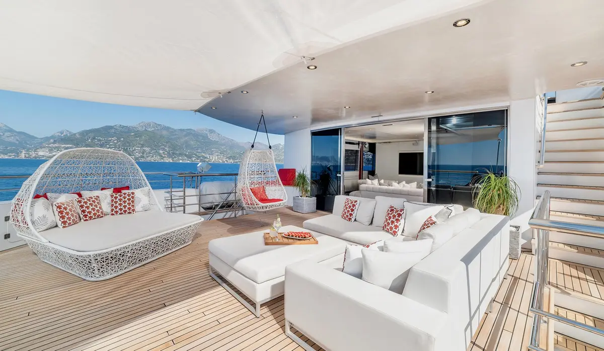Philip Zepter 50m, flybridge — Mallorca Yachst Hire, Mallorca. Fifty metres of calm beneath Tramuntana's cliffs at sunset