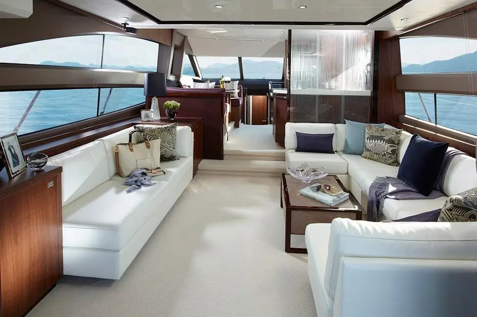 Princess 68 Fly, aft deck — Mallorca Yachst Hire, Mallorca. Sunset runs along Illetes, flybridge open to the sky