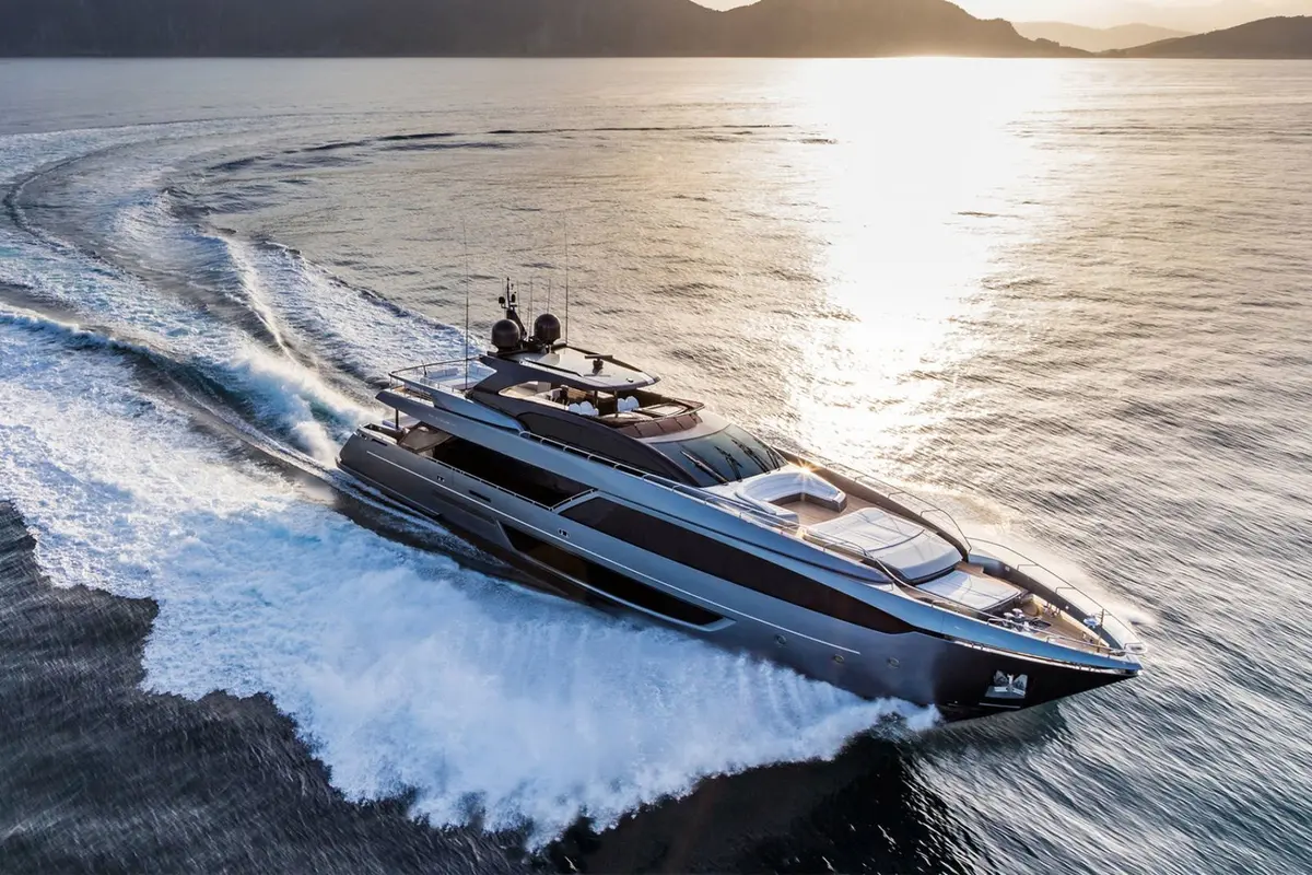 Riva 110, main deck — Mallorca Yachst Hire, Mallorca. Sleek hull, quiet power, sunset runs toward Illetes