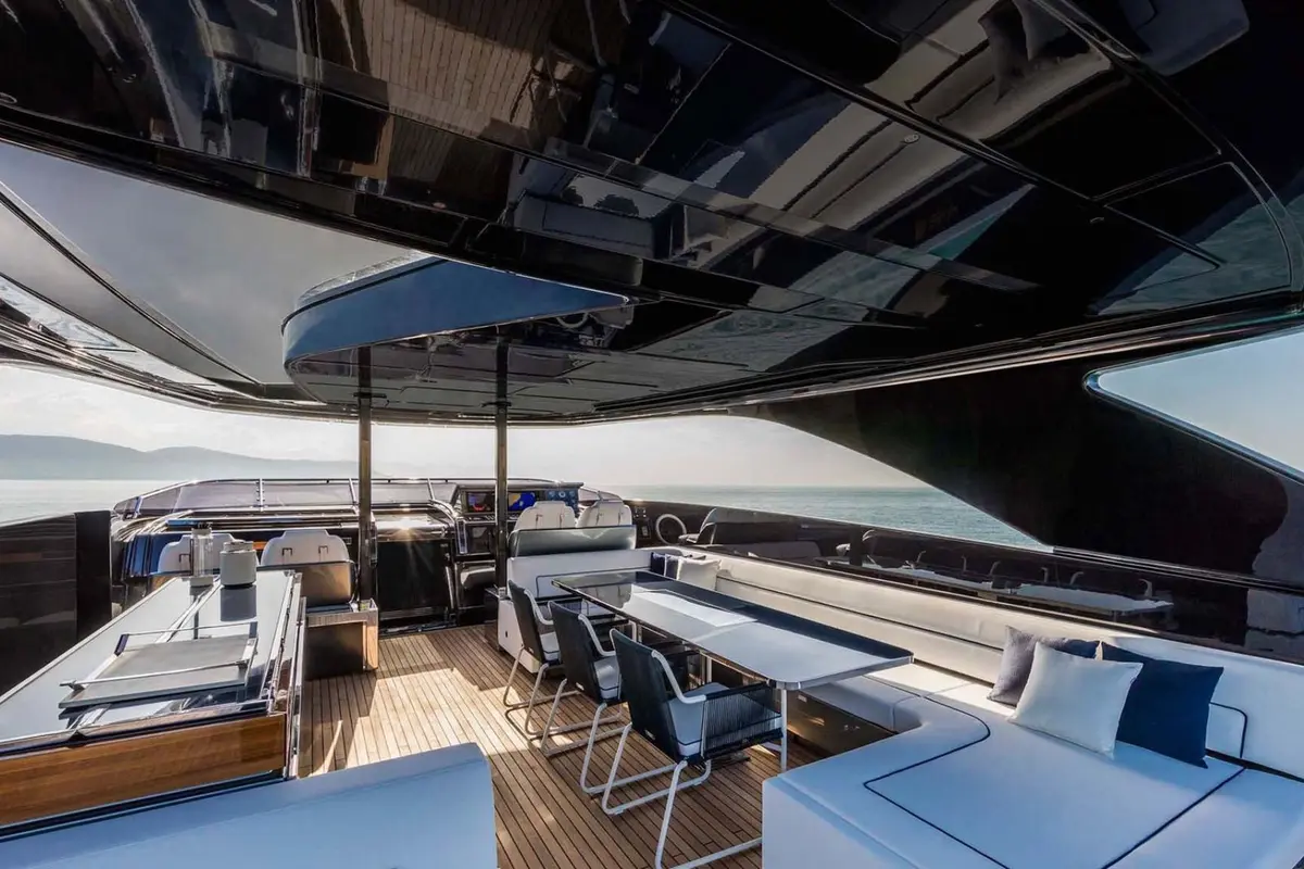 Riva 110, flybridge — Mallorca Yachst Hire, Mallorca. Sleek hull, quiet power, sunset runs toward Illetes