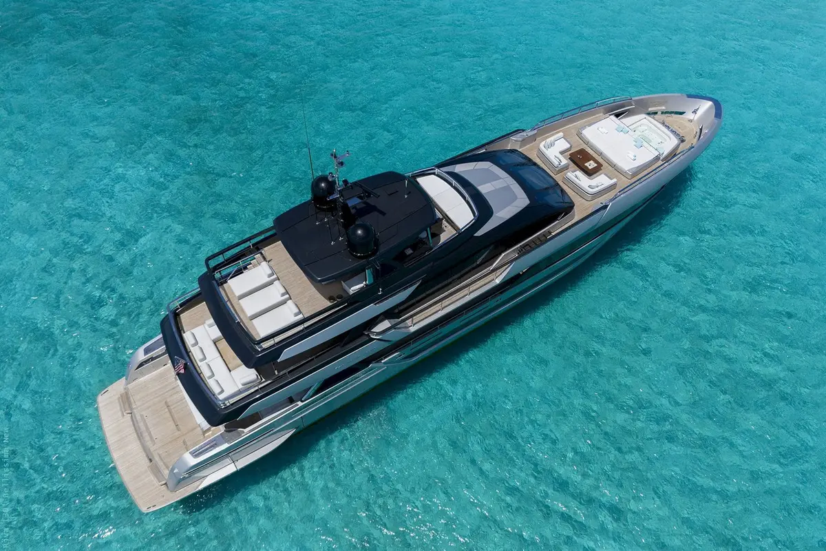 Riva 130, main deck — Mallorca Yachst Hire, Mallorca. Forty metres tracing Formentor's cliffs at sunset