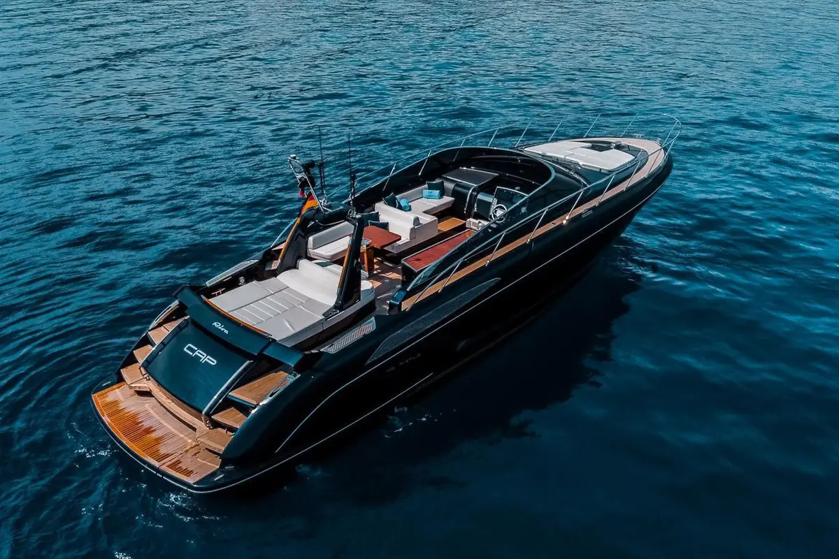 Riva 56 Rivale, exterior — Mallorca Yachst Hire, Mallorca. Sleek Italian lines for sunset runs along Illetes