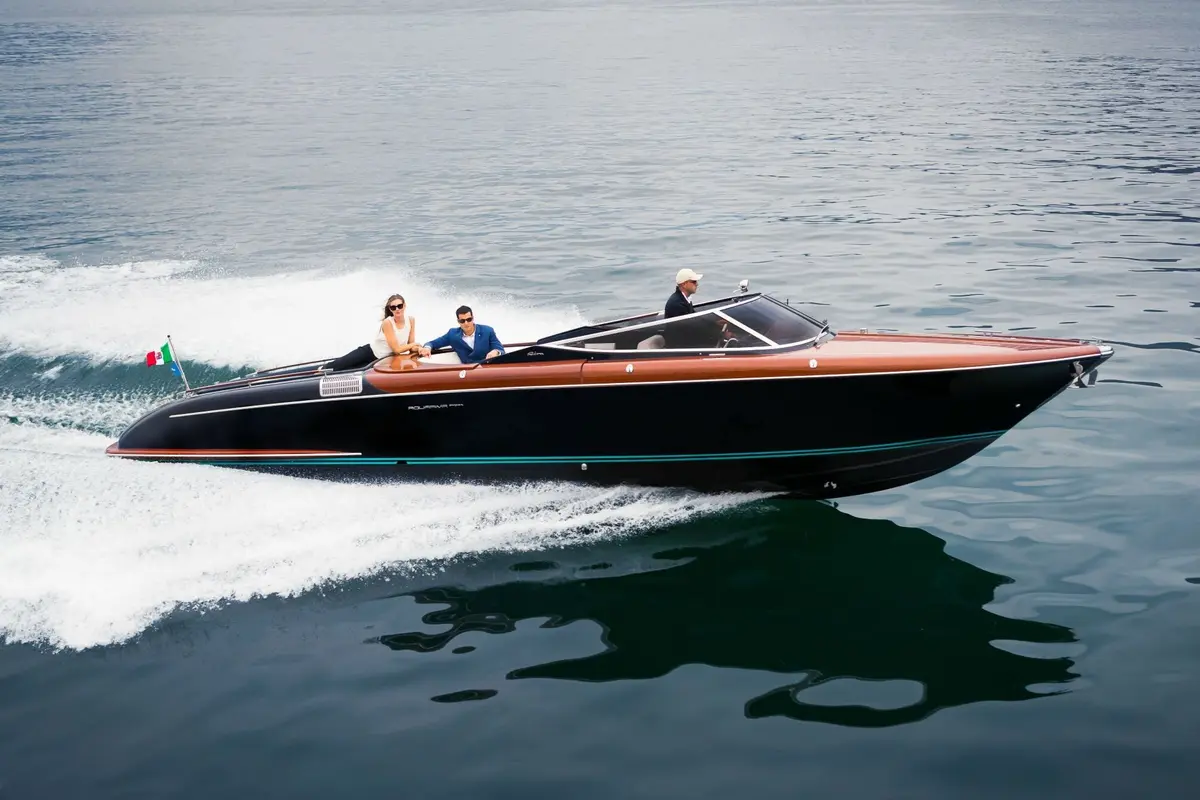 Riva Aquariva, exterior — Mallorca Yachst Hire, Mallorca. Sleek day cruising to Illetes before sunset