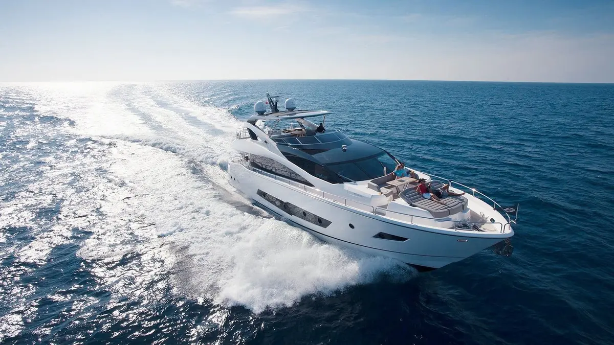 Sunseeker 86, main deck — Mallorca Yachst Hire, Mallorca. Sunset runs from Palma toward Illetes, unhurried