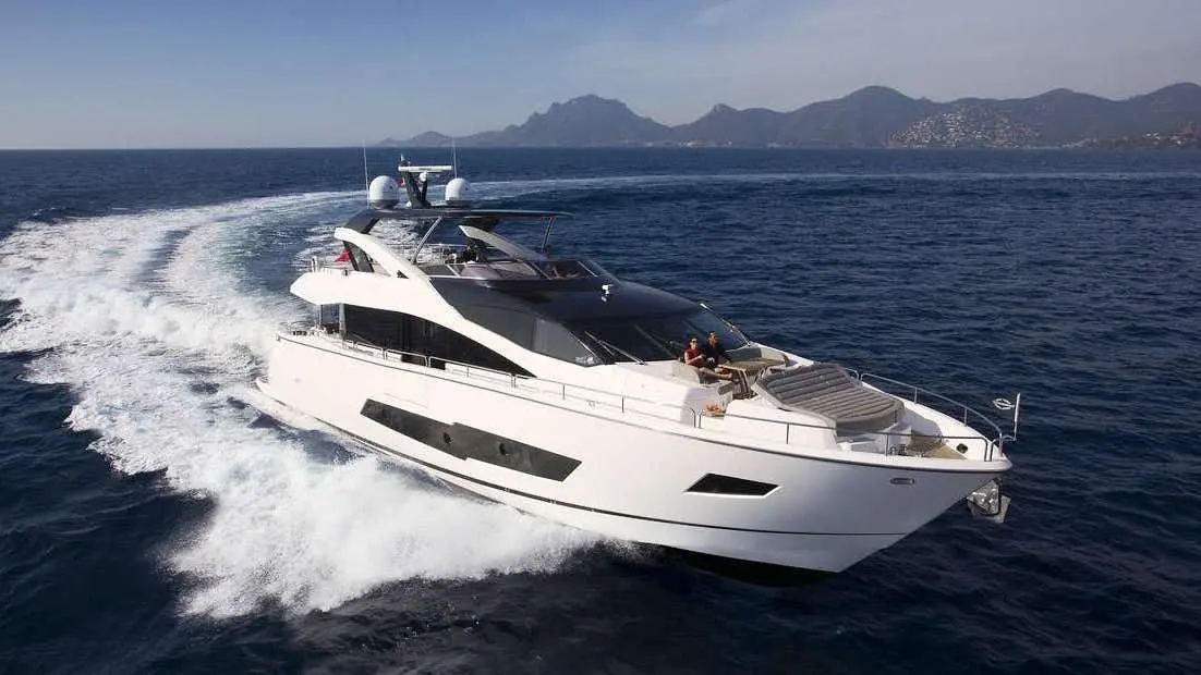 Sunseeker 86, aft deck — Mallorca Yachst Hire, Mallorca. Sunset runs from Palma toward Illetes, unhurried