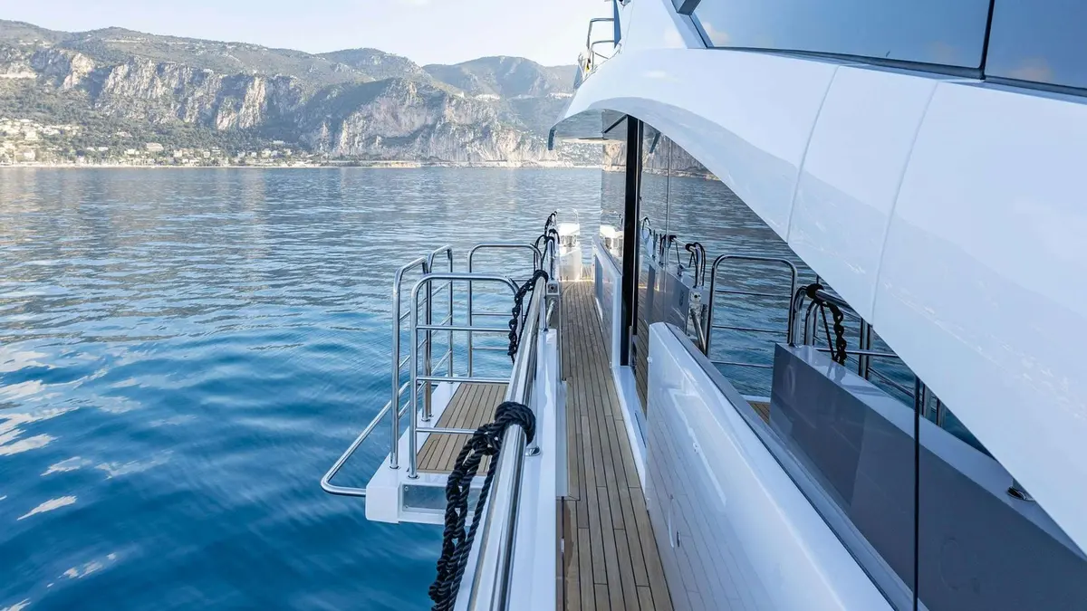 Sunseeker 86, master cabin — Mallorca Yachst Hire, Mallorca. Sunset runs from Palma toward Illetes, unhurried