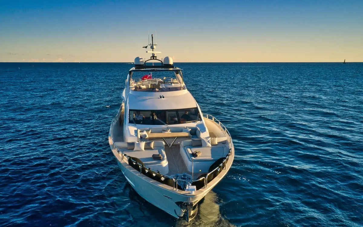 Sunseeker 95, aft deck — Mallorca Yachst Hire, Mallorca. Sunset runs along Illetes, twenty-nine metres of calm speed