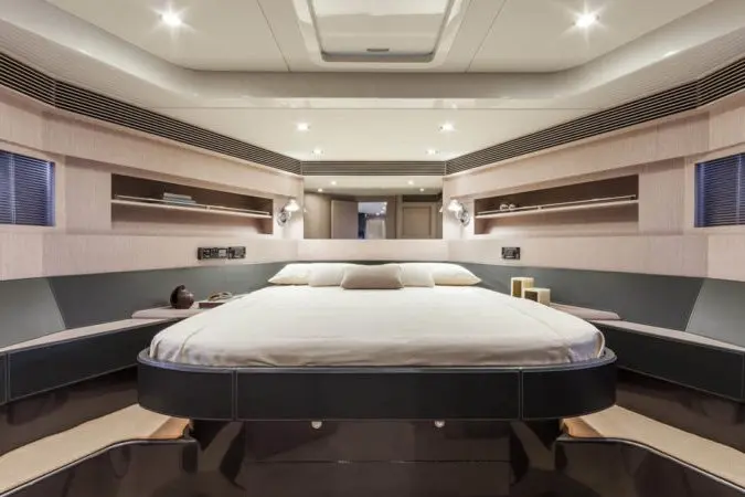 Virtus 63, master cabin — Mallorca Yachst Hire, Mallorca. Sleek lines racing toward Illetes at golden hour