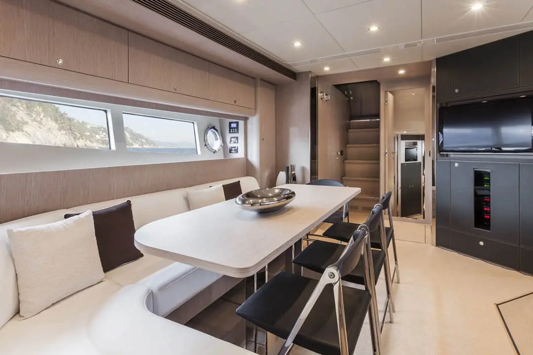 Virtus 63, flybridge — Mallorca Yachst Hire, Mallorca. Sleek lines racing toward Illetes at golden hour